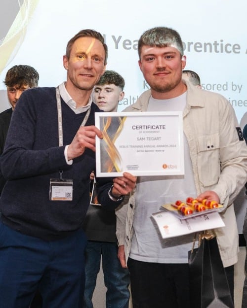 Sam Tagert receiving an apprenticeship award